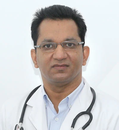 Dr. Muneer MK